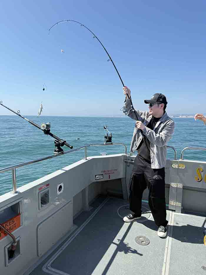 Binghao doing deep sea fishing